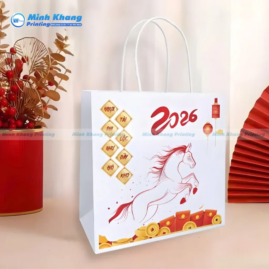 Mẫu túi giấy đựng quà Tết 2026 nhỏ gọn, chuyên dùng cho các bộ quà mini hoặc túi giấy đựng bánh kẹo ngày Tết