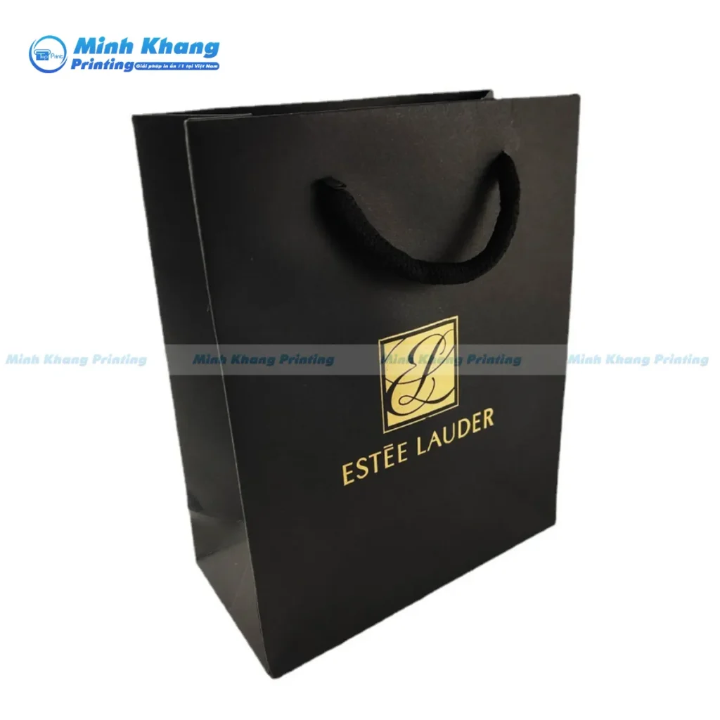 Mẫu túi giấy ép kim vàng , nền đen Estee Lauder đựng mỹ phẩm