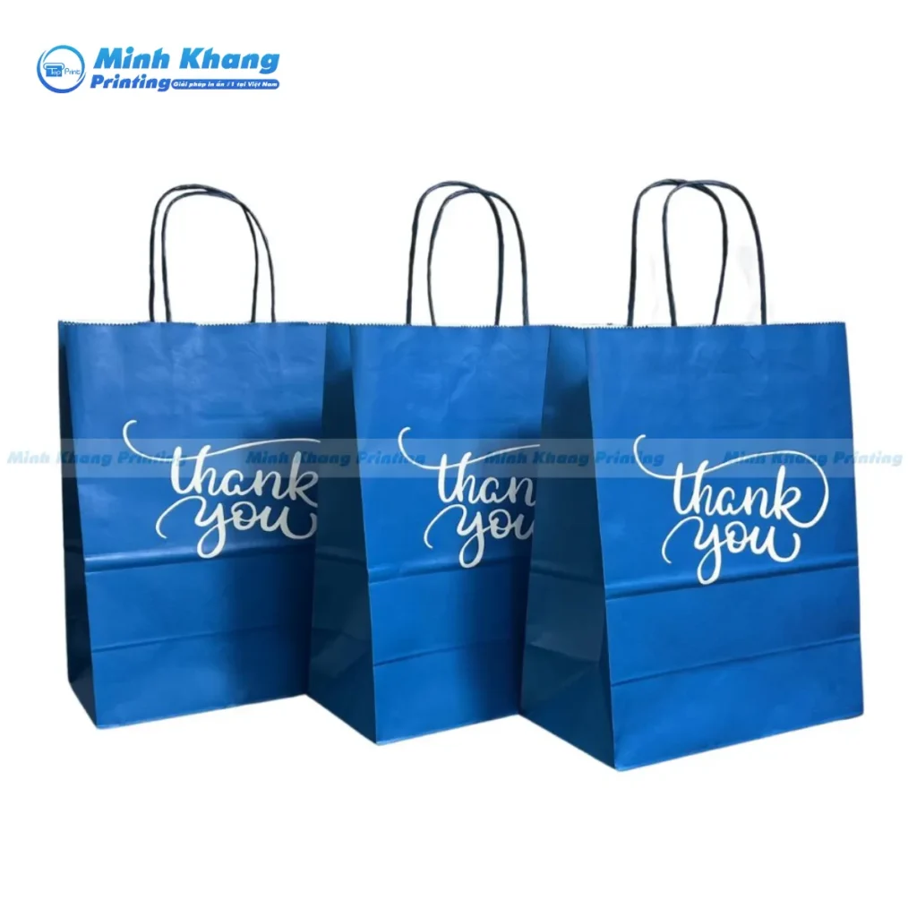 Mẫu túi giấy xanh cho shop thời trang chất liệu giấy kraft